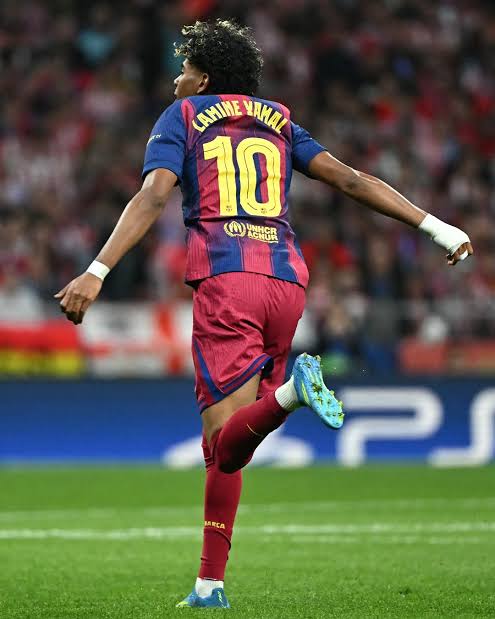 Lamine Yamal celebrating a goal for Barcelona wearing number 10